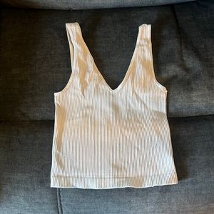 Boutique bought Light beige cropped tank. size small